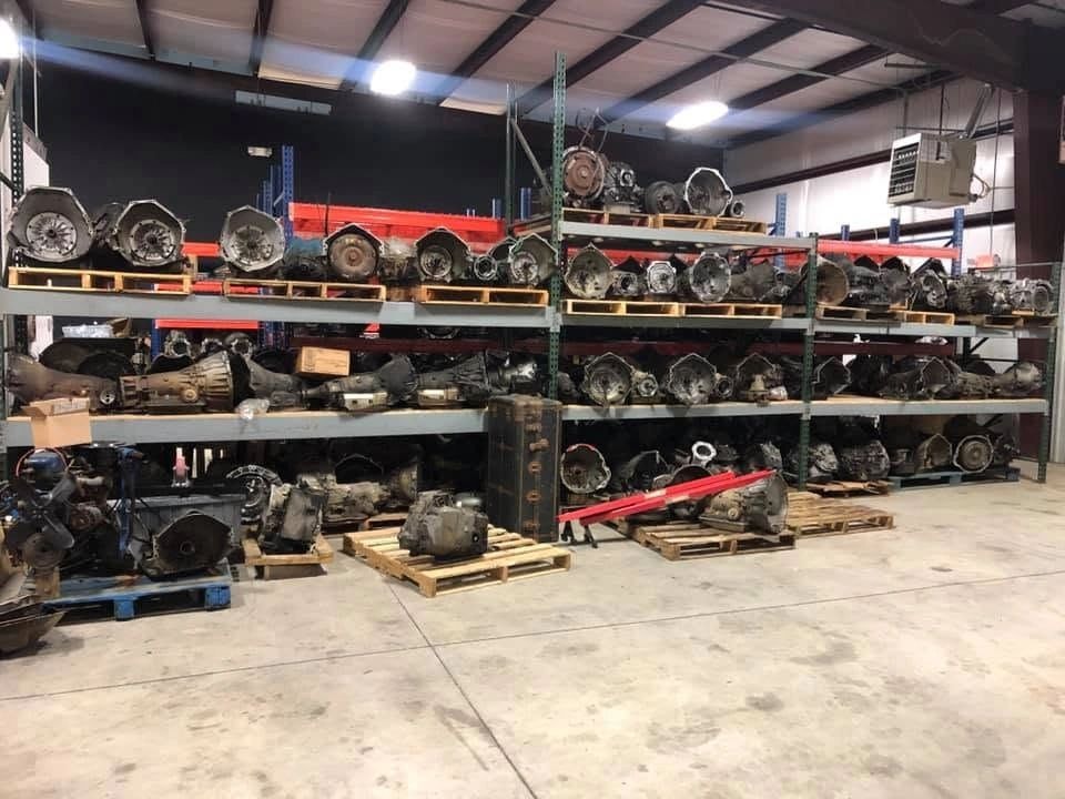 Transmission parts and shelving inside Specialized Transmission shop